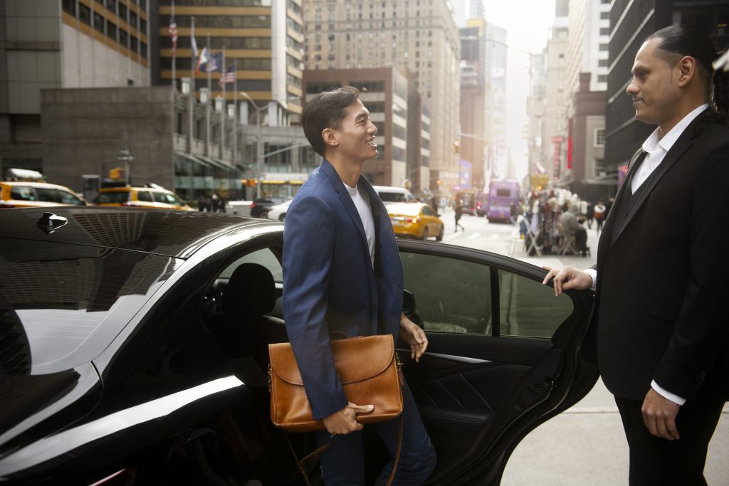 Customer tripping over uneven pavement in a parking lot, parking lot injury lawyer documenting evidence